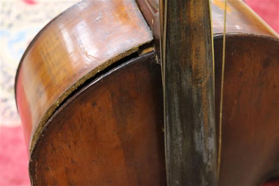 A full sized cello bearing label Arthur Richardson ... and two bows (one silver mounted), the other signed Wilhelm ... uhl